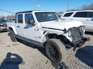 2023 Jeep Gladiator High Altitude with VIN 1C6HJTFG4PL560982, listed as a IAAI auction lot 41236477 with 28,835 mi miles and . Bid and sale history available at DreamBid. Image 1.