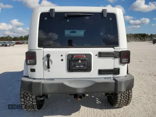 2015 Jeep Wrangler Unlimited Sahara with VIN 1C4BJWEG6FL614671, listed as a Copart auction lot 86052284 with 92,894 mi miles and Salvage title. Bid and sale history available at DreamBid. Image 6.