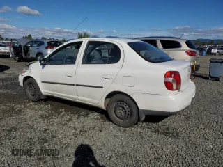 2002 Toyota ECHO with VIN JTDBT123020215409, listed as a Copart auction lot 71653384 with 265,969 mi miles and Salvage Title. Bid and sale history available at carsss.com. Image 2.