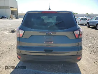 2018 Ford Escape S with VIN 1FMCU0F7XJUA28402, listed as a Copart auction lot 57955745 with 104,625 mi miles and Salvage title. Bid and sale history available at DreamBid. Image 6.