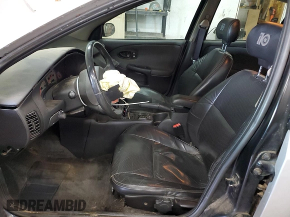 2001 Saturn SL with VIN 1G8ZK54791Z298951, listed as a Copart auction lot 89198795 with 157,208 mi miles and Salvage title. Bid and sale history available at DreamBid. Image 7.