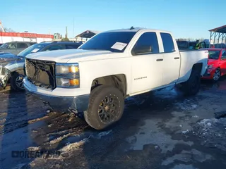 2014 Chevrolet Silverado 1500 LT with VIN 1GCVKREH4EZ148979, listed as a IAAI auction lot 41215714 with 193,710 mi miles and . Bid and sale history available at DreamBid. Image 18.