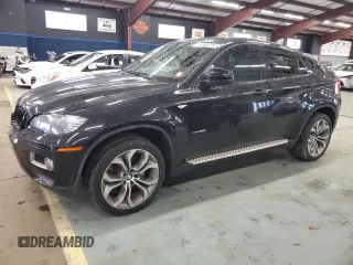 2014 BMW X6 50i z VIN 5UXFG8C56EL592617, wystawiony jako Copart lot #81980274 z przebiegiem 90 466 mil mil oraz Czysty tytuł • Clean title. Historia ofert i sprzedaży dostępna na DreamBid. Obrazek 1.