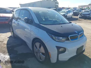 2015 BMW i3 with VIN WBY1Z4C53FV502598, listed as a IAAI auction lot 41459598 with 73,293 mi miles. Bid and sale history available at carsss.com. Image 1.