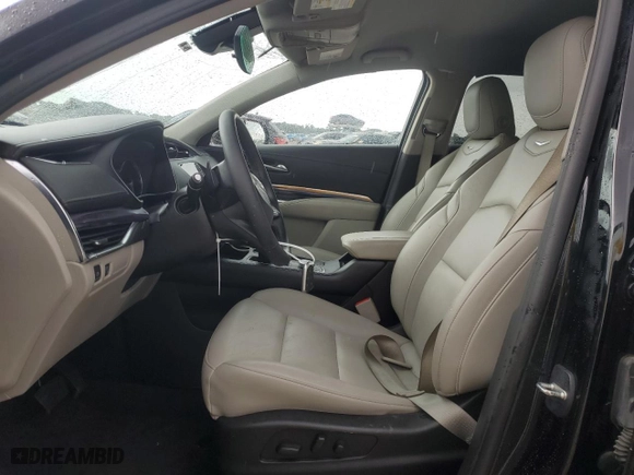 2023 Cadillac XT4 FWD Luxury with VIN 1GYAZAR45PF218684, listed as a Copart auction lot 54427565 with 74,920 mi miles and Salvage Title. Bid and sale history available at carsss.com. Image 7.