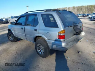 2000 Honda Passport LX with VIN 4S6CK58W4Y4415990, listed as a IAAI auction lot 41177782 with 242,583 mi miles. Bid and sale history available at carsss.com. Image 3.