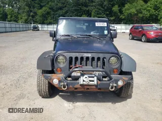 2012 Jeep Wrangler Sport z VIN 1C4AJWAG2CL245174, wystawiony jako Copart lot #63161425 z przebiegiem 136 626 mil mil oraz Czysty tytuł • Clean title. Historia ofert i sprzedaży dostępna na DreamBid. Obrazek 5.