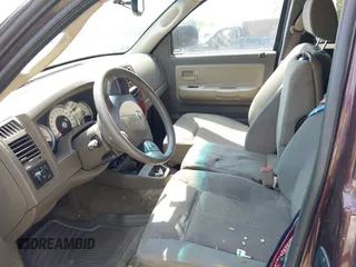 2005 Dodge Dakota SLT with VIN 1D7HE42N05S193871, listed as a IAAI auction lot 42587320 with 130,122 mi miles and . Bid and sale history available at DreamBid. Image 5.