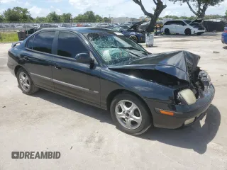2003 Hyundai Elantra GLS with VIN KMHDN45D03U500898, listed as a Copart auction lot 61473825 with 127,252 mi miles and Salvage title. Bid and sale history available at DreamBid. Image 4.