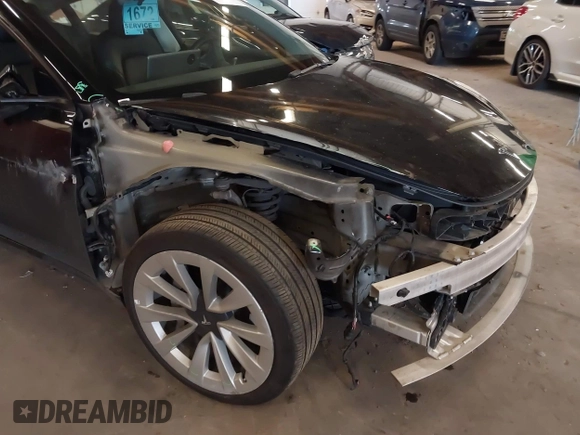 2022 Tesla Model 3 with VIN 5YJ3E1EA4NF187113, listed as a IAAI auction lot 41712331 with 81,879 mi miles and . Bid and sale history available at DreamBid. Image 21.