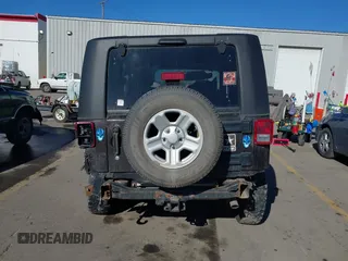 2013 Jeep Wrangler Sport with VIN 1C4AJWAG0DL645039, listed as a IAAI auction lot 41847808 with Not provided miles and . Bid and sale history available at DreamBid. Image 16.