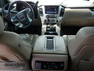 2016 GMC Yukon SLT z VIN 1GKS2BKC6GR343640, wystawiony jako Copart lot #55472325 z przebiegiem 217 065 mil mil oraz Szkoda całkowita • Salvage title. Historia ofert i sprzedaży dostępna na DreamBid. Obrazek 8.