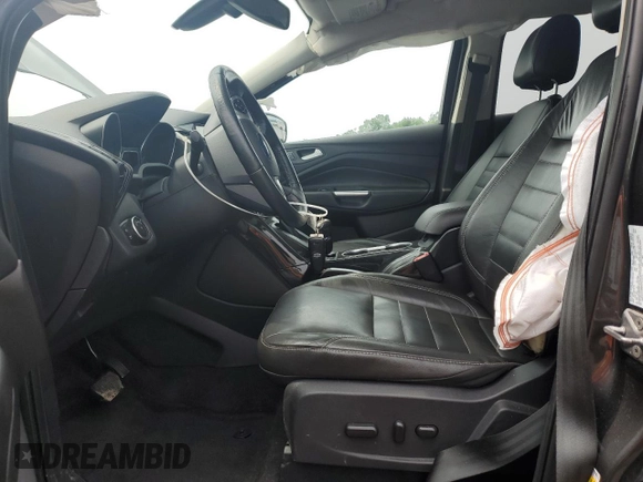 2016 Ford Escape Titanium with VIN 1FMCU9J90GUA01974, listed as a Copart auction lot 60376265 with 177,384 mi miles and Salvage title. Bid and sale history available at DreamBid. Image 7.