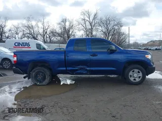2014 Toyota Tundra SR with VIN 5TFUM5F17EX056082, listed as a IAAI auction lot 41884095 with 155,036 mi miles and . Bid and sale history available at DreamBid. Image 13.
