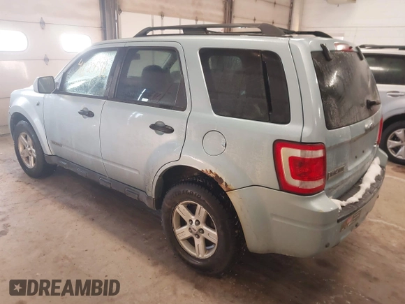 2008 Ford Escape Hybrid with VIN 1FMCU49H58KC63839, listed as a IAAI auction lot 41623596 with 218,566 mi miles and . Bid and sale history available at DreamBid. Image 3.