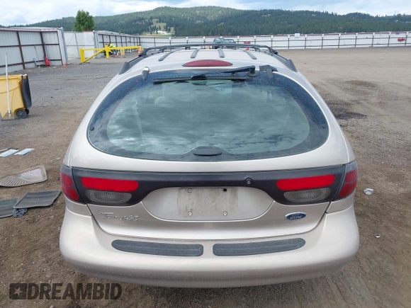 1998 Ford Taurus with VIN 1FAFP57U8WG275844, listed as a IAAI auction lot 42426107 with 318,654 mi miles and . Bid and sale history available at DreamBid. Image 16.