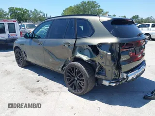 2024 BMW X5 M60i with VIN 5UX33EU04R9U60278, listed as a IAAI auction lot 42060054 with 18,215 mi miles. Bid and sale history available at carsss.com. Image 3.