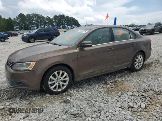 2014 Volkswagen Jetta TDI w/Premium/Nav z VIN 3VWLL7AJ8EM253721, wystawiony jako Copart lot #61551515 z przebiegiem 155 745 mil mil oraz Czysty tytuł • Clean title. Historia ofert i sprzedaży dostępna na DreamBid. Obrazek 1.