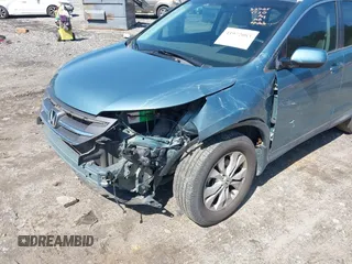 2014 Honda CR-V EX-L with VIN 2HKRM3H74EH533638, listed as a IAAI auction lot 41972083 with 165,663 mi miles and . Bid and sale history available at carsss.com. Image 6.