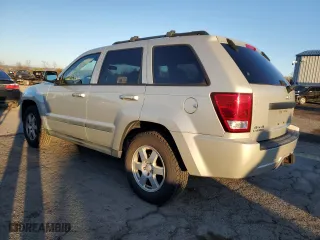 2009 Jeep Grand Cherokee Laredo with VIN 1J8GR48K89C551203, listed as a Copart auction lot 49252125 with 122,071 mi miles and Salvage Title. Bid and sale history available at carsss.com. Image 2.