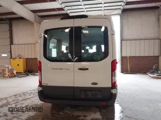 2018 Ford Transit Passenger XL with VIN 1FMZK1CM8JKA27308, listed as a IAAI auction lot 41460974 with 66,278 mi miles and . Bid and sale history available at DreamBid. Image 16.