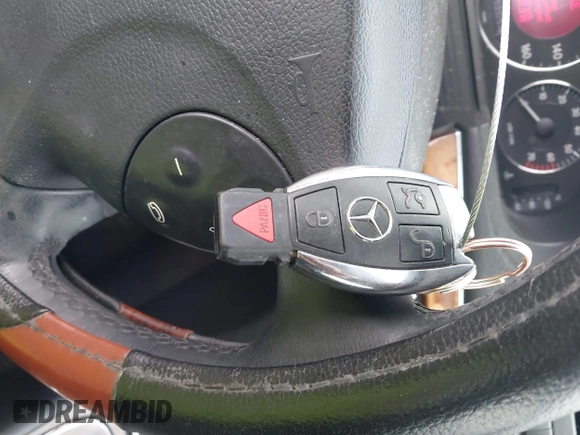 2004 Mercedes-Benz E-Class 5.0L with VIN WDBUF70J14A522118, listed as a IAAI auction lot 41786440 with 153,325 mi miles. Bid and sale history available at carsss.com. Image 11.