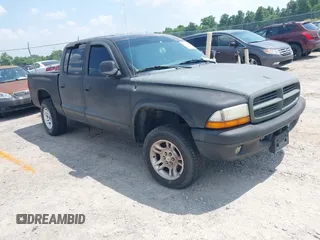 2004 Dodge Dakota SLT z VIN 1D7HG48N34S693877, wystawiony jako IAAI lot #42423197 z przebiegiem 163 141 mil mil oraz . Historia ofert i sprzedaży dostępna na DreamBid. Obrazek 1.