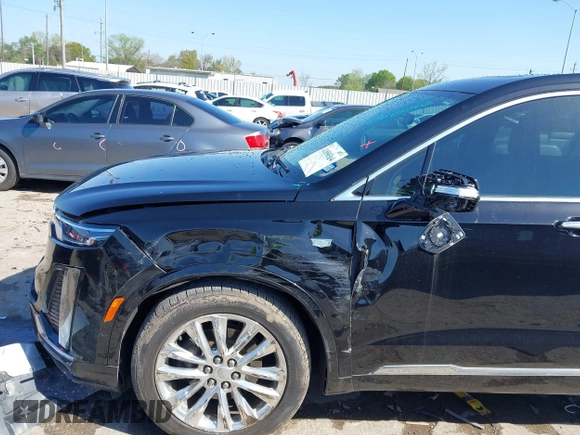 2020 Cadillac XT6 FWD Premium Luxury z VIN 1GYKPERS0LZ232338, wystawiony jako IAAI lot #41845562 z przebiegiem 86 839 mil mil oraz . Historia ofert i sprzedaży dostępna na DreamBid. Obrazek 6.