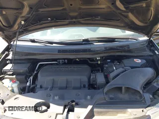 2014 Honda Odyssey Touring with VIN 5FNRL5H99EB133864, listed as a IAAI auction lot 42201359 with 122,490 mi miles and . Bid and sale history available at DreamBid. Image 10.