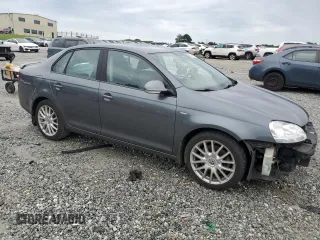 2008 Volkswagen Jetta Wolfsburg Edition with VIN 3VWRJ71K98M126974, listed as a Copart auction lot 58475155 with 115,038 mi miles and Salvage title. Bid and sale history available at DreamBid. Image 4.