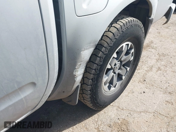 2018 Nissan Frontier SV with VIN 1N6AD0EV0JN761092, listed as a IAAI auction lot 41502701 with 103,900 mi miles and . Bid and sale history available at DreamBid. Image 6.