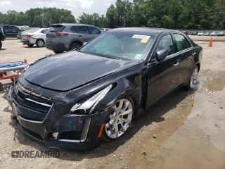 2015 Cadillac CTS Premium AWD with VIN 1G6AZ5S38F0116993, listed as a Copart auction lot 63087095 with 100,533 mi miles and Salvage title. Bid and sale history available at DreamBid. Image 1.