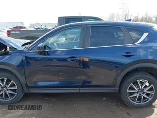 2018 Mazda CX-5 Touring with VIN JM3KFBCM5J0369799, listed as a IAAI auction lot 41895364 with 76,801 mi miles and . Bid and sale history available at carsss.com. Image 14.
