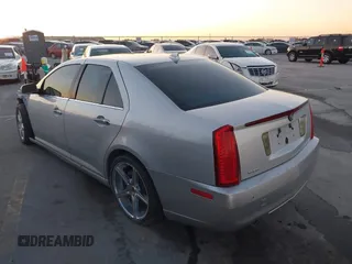 2011 Cadillac STS RWD w/1SB with VIN 1G6DW6ED8B0145873, listed as a IAAI auction lot 41104393 with 212,743 mi miles. Bid and sale history available at carsss.com. Image 3.