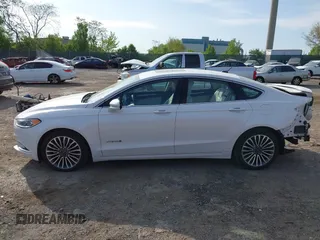 2017 Ford Fusion Hybrid Titanium с VIN 3FA6P0RU7HR148191, выставлен на аукционе IAAI как лот 42167708 с пробегом 72 708 миль миль и . История ставок и продаж доступна на DreamBid. Изображение 15.