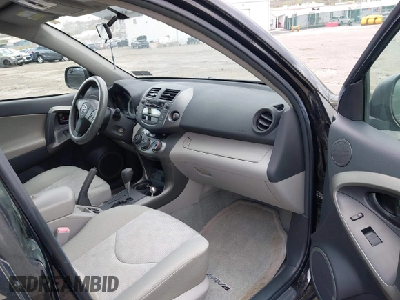 2011 Toyota RAV4 with VIN 2T3BF4DV4BW128048, listed as a IAAI auction lot 42049343 with 61,965 mi miles. Bid and sale history available at carsss.com. Image 5.