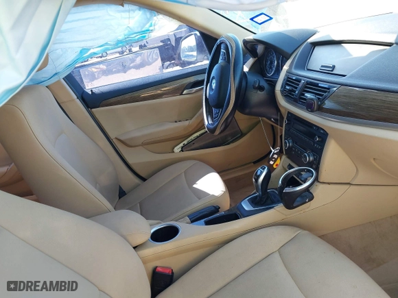 2015 BMW X1 sDrive28i with VIN WBAVM1C51FVZ94433, listed as a IAAI auction lot 41425205 with 148,346 mi miles. Bid and sale history available at carsss.com. Image 5.