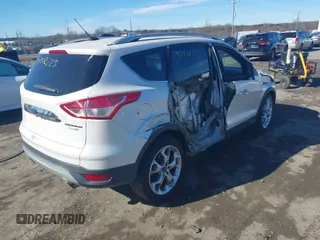 2016 Ford Escape Titanium with VIN 1FMCU9J96GUB65441, listed as a IAAI auction lot 41412223 with 74,218 mi miles. Bid and sale history available at carsss.com. Image 4.