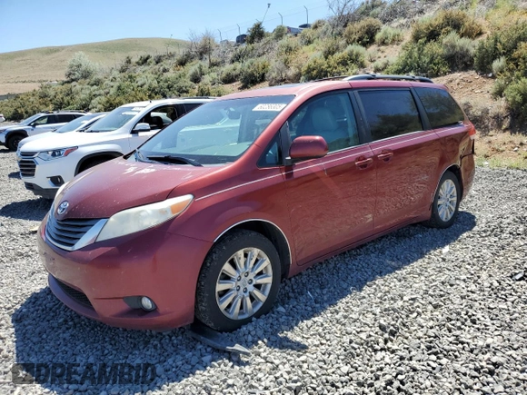 2012 Toyota Sienna XLE with VIN 5TDDK3DC0CS041425, listed as a Copart auction lot 60286305 with 214,634 mi miles and Salvage title. Bid and sale history available at DreamBid. Image 1.