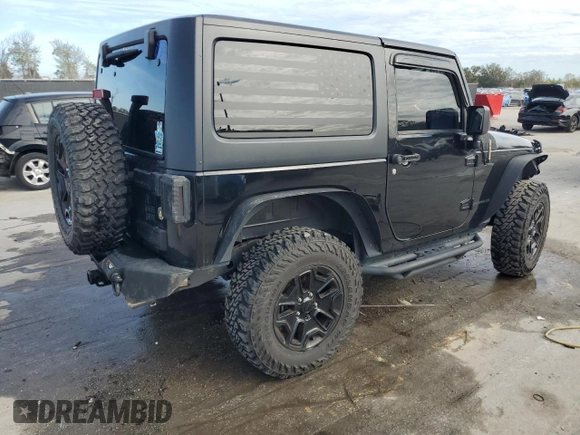 2017 Jeep Wrangler Willys Wheeler with VIN 1C4AJWAG1HL624254, listed as a Copart auction lot 42678975 with 51,936 mi miles and Salvage Title. Bid and sale history available at DreamBid. Image 3.