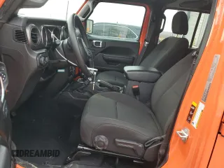 2023 Jeep Wrangler Sport S with VIN 1C4HJXDG6PW675682, listed as a Copart auction lot 41446855 with 22,816 mi miles and Salvage Title. Bid and sale history available at DreamBid. Image 7.