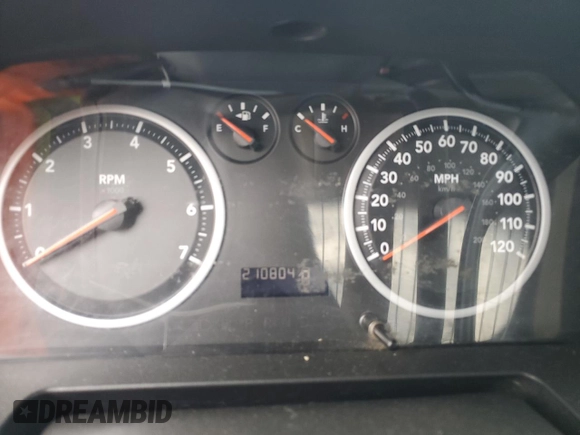 2012 Ram 1500 ST with VIN 3C6JD6DK0CG128253, listed as a Copart auction lot 57774485 with 210,804 mi miles and Clean title. Bid and sale history available at DreamBid. Image 9.