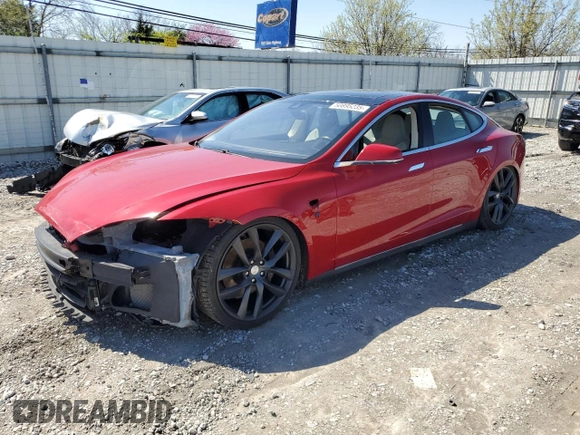 2014 Tesla Model S 60 with VIN 5YJSA1S12EFP65799, listed as a Copart auction lot 50895235 with 132,669 mi miles and Salvage Title. Bid and sale history available at DreamBid. Image 1.
