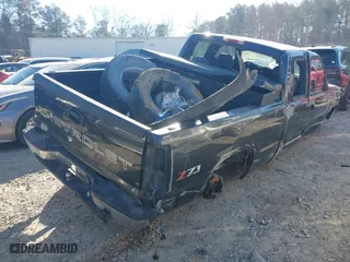 2003 Chevrolet Silverado 1500 Work Truck with VIN 2GCEC19XX31352031, listed as a IAAI auction lot 41283482 with 131,106 mi miles. Bid and sale history available at carsss.com. Image 4.