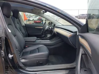 2023 Tesla Model 3 with VIN 5YJ3E1EA8PF454210, listed as a IAAI auction lot 42326822 with 43,200 mi miles and . Bid and sale history available at DreamBid. Image 5.