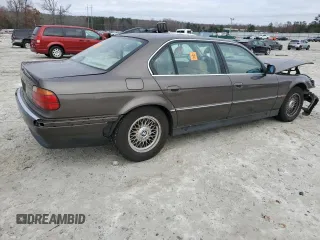 1997 BMW 7 Series 740il with VIN WBAGJ8325VDM01757, listed as a Copart auction lot 85734614 with 190,453 mi miles and Non Repairable. Bid and sale history available at carsss.com. Image 3.