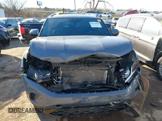 2021 Volkswagen Atlas SEL Premium with VIN 1V2TE2CAXMC215550, listed as a IAAI auction lot 41579665 with 55,264 mi miles and . Bid and sale history available at DreamBid. Image 12.