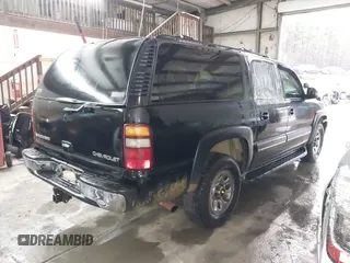 2003 Chevrolet Suburban LS z VIN 1GNFK16T93J211098, wystawiony jako IAAI lot #41494713 z przebiegiem 366 222 mil mil oraz . Historia ofert i sprzedaży dostępna na DreamBid. Obrazek 4.