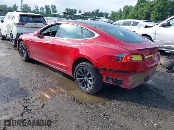 2020 Tesla Model S Long Range with VIN 5YJSA1E25LF396213, listed as a IAAI auction lot 42383231 with 73,125 mi miles and . Bid and sale history available at DreamBid. Image 3.