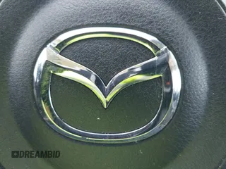 2018 Mazda CX-5 Touring z VIN JM3KFACM7J1410275, wystawiony jako IAAI lot #42248830 z przebiegiem 101 125 mil mil oraz . Historia ofert i sprzedaży dostępna na DreamBid. Obrazek 6.